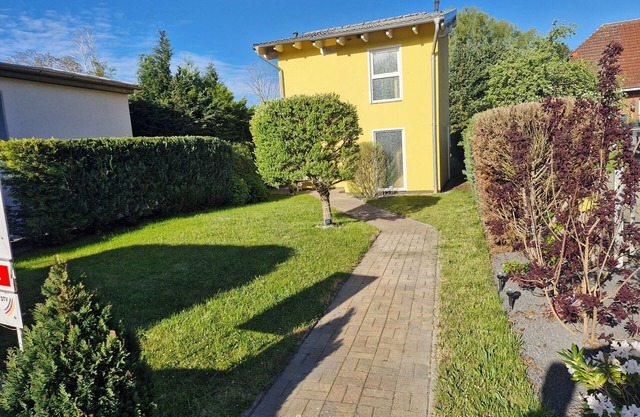 Ferienhaus eigener Parkplatz mit E-Ladestation(Wallbox), Netflix, WLAN, Garten