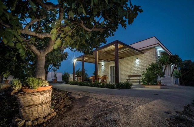 Vacation House "Ulivi nel Mare" typical country home, surrounded by olive trees.
