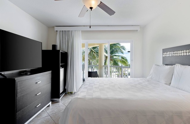 Vacation is Calling! Outdoor Pool, Free Parking, Steps Away from the Beach!