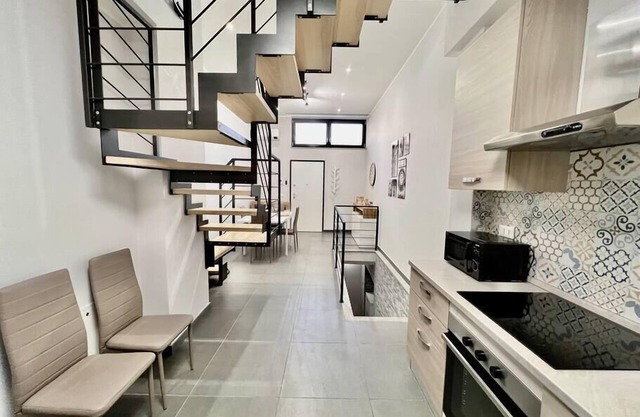 Valuable Duplex one minute from the metro