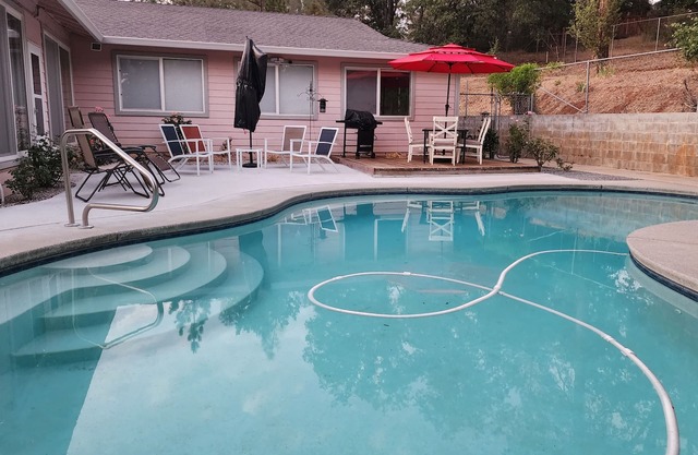 Very private resort-like setting with spacious home, in ground pool, sauna etc.