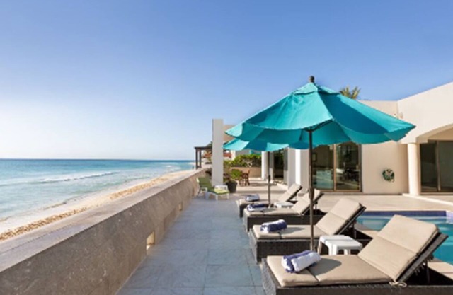 Villa El Dorado is a chic contemporary oceanfront private oasis