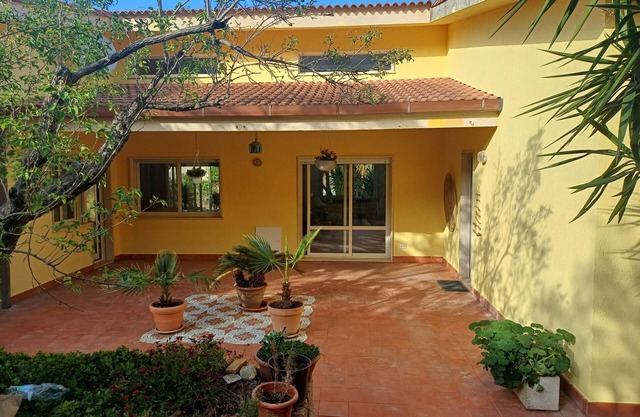 Villa entirely surrounded by garden a stone's throw from the sea.