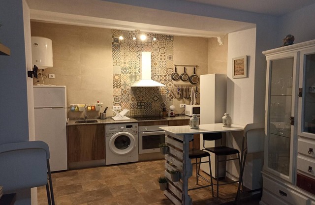 Wohnung in einem traditionellen andalusischen Haus mit Terrasse