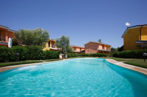 Villa Mama con piscina condominiale, giardino e barbecue