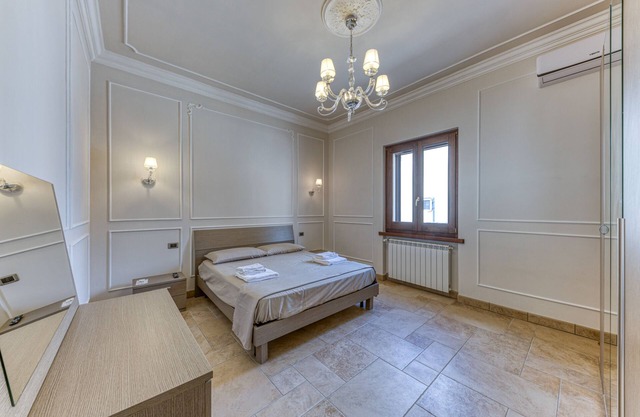 Villa 'Marta' mit privater Terrasse, privatem Garten und Klimaanlage