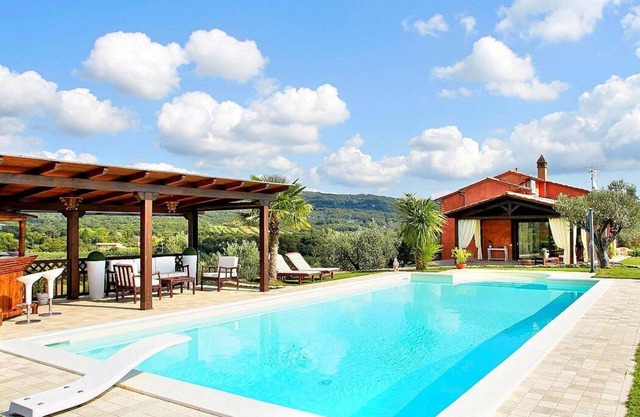 Villa Norma: An elegant and welcoming two-story villa located on top of a small hill, with Free WI-FI.