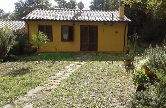 Villa with garden surrounded by nature