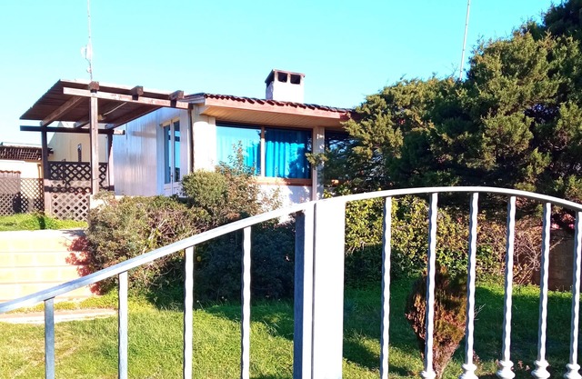 Villa with private beach access, garden and parking space