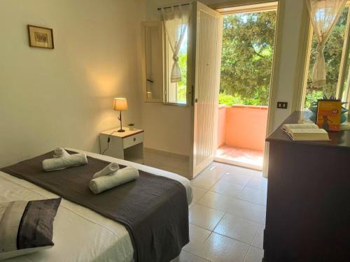 Villaggio Portorosa - La casetta tra le palme 18