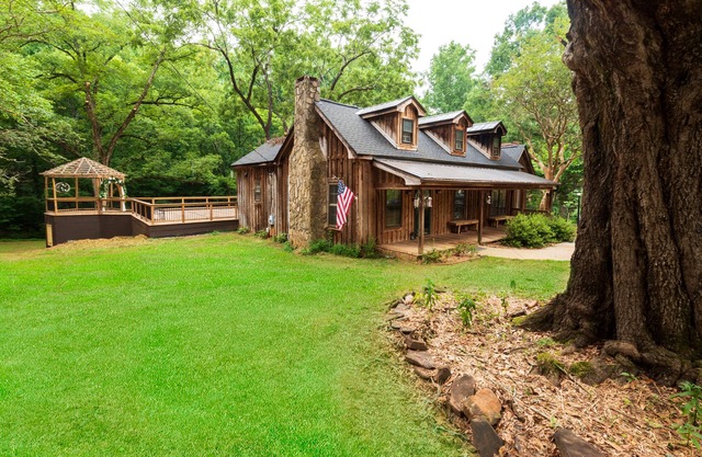 Vintage charm meets modern comfort in this historic 1850s cabin at Lake Hartwell