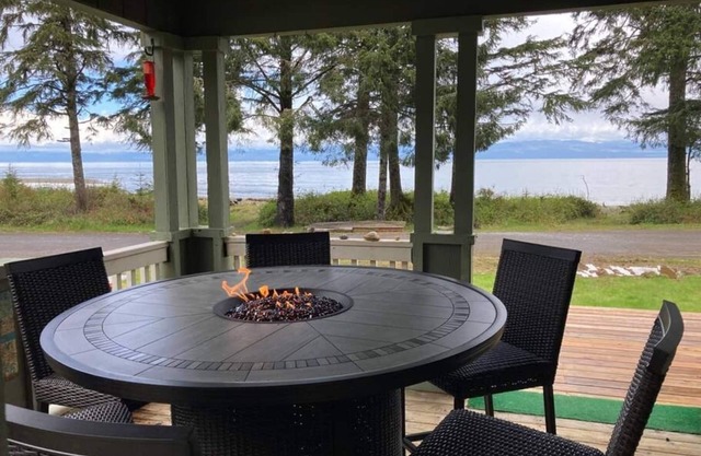 Walk out the front door, across a grass lawn and onto a sandy beach