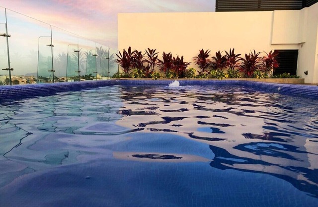 Walk to 5th Ave & Beach | Oceanview Rooftop Pool
