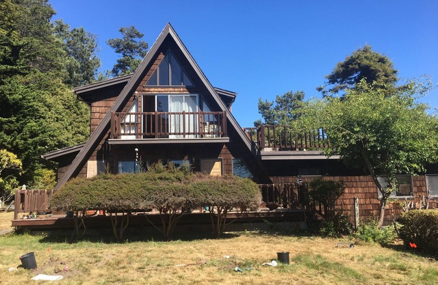 Walk to beach and enjoy ocean view sunset from the expansive roof deck & master.