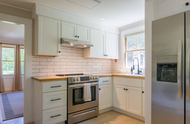 Walk to the beach from this classy and compact cottage