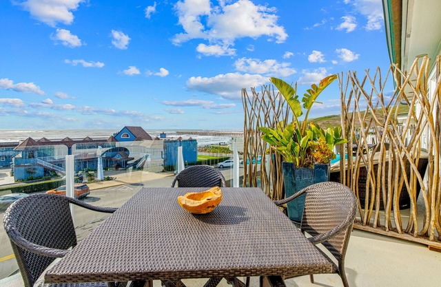 Walkable ocean-view townhome with furnished balcony & firepit - dog-friendly