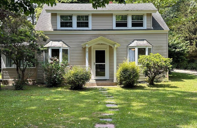 Warm Peconic home…short walk to a private beach.