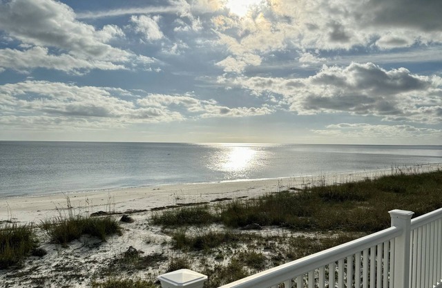 Watch dolphins frolic or an amazing sunset from your private deck on the Gulf!
