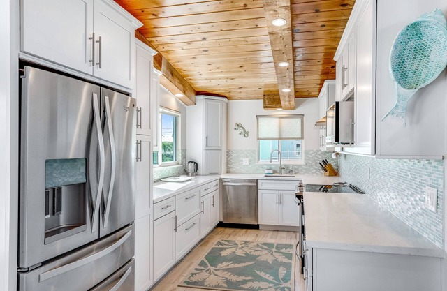Water-view house with private dock, washer/dryer & grill - snowbird-friendly