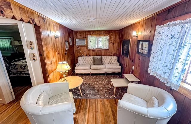 Waterfront 2BR cottage, beach, dock, lake views, fishing, wifi, partial A/C