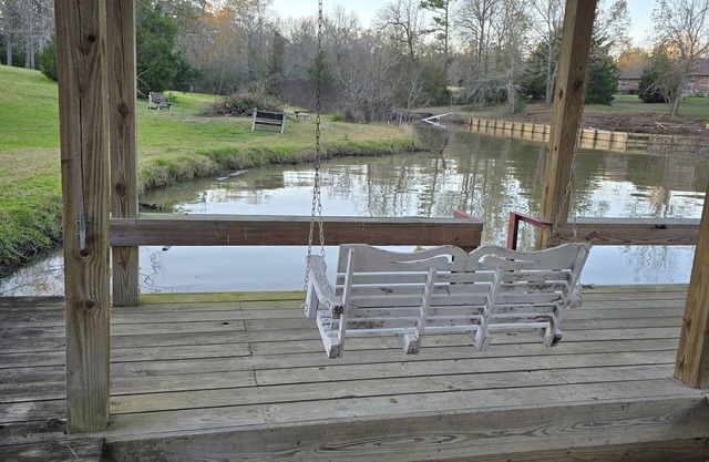 Waterfront 4-bedroom estate with Indoor Pool and covered fishing dock Fire Pit