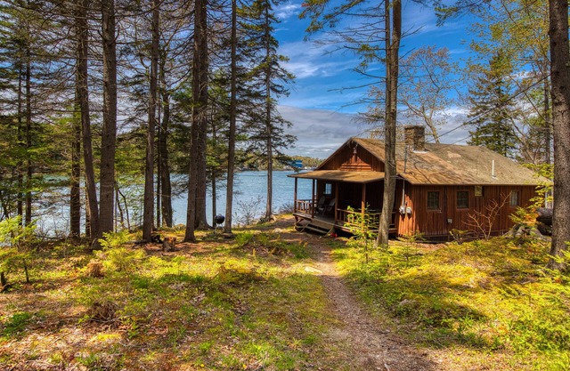 Kabine am Wasser mit Meerblick, Kamin und eigenem Dock