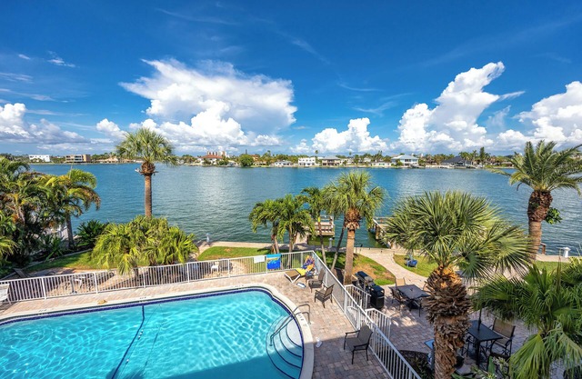 Waterfront Condo Pool Fishing Docks Across from the Beach