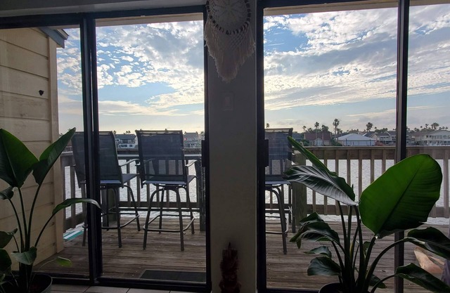 Waterfront condo with incredible sunset view and fishing from the pier.