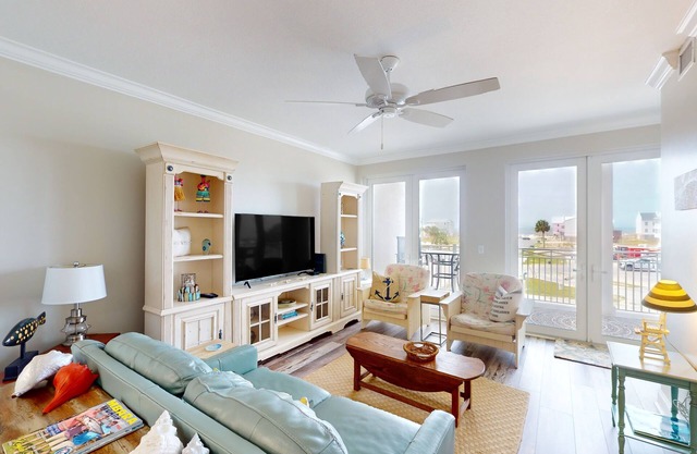 Waterfront condo with pool, hot tub, furnished lanai, fireplace & chic furniture