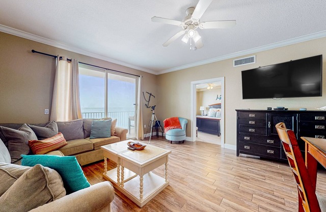 Waterfront condo with on-site pool, private balcony, AC, & W/D