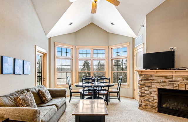 Waterfront condo with loft, washer/dryer, fireplace, balcony, pools, & hot tubs
