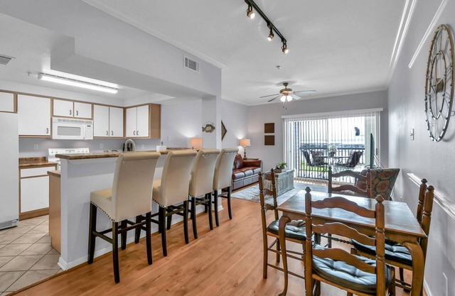 Waterfront Condo with Patio, Pool Access & Walk to Dining—Perfect for Your Next Relaxing Getaway!