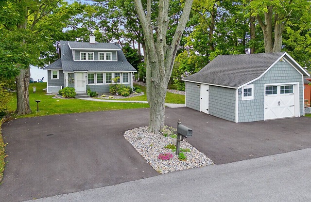 Waterfront Cottage with fireplace located directly on Owasco Lake.