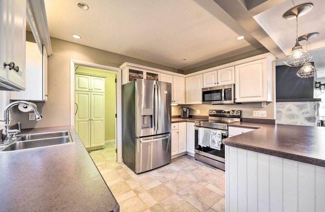 Waterfront Dewittville Condo w/ Furnished Balcony!