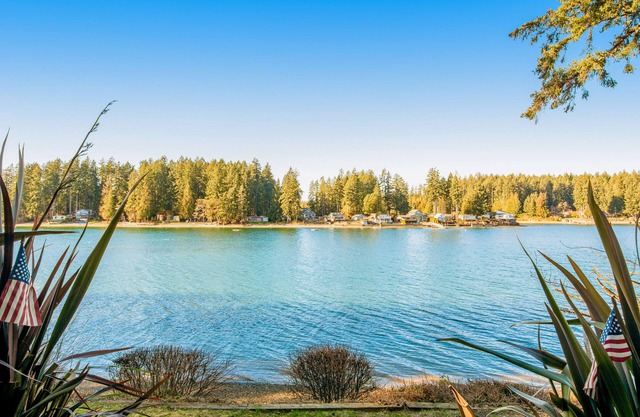 Waterfront, dog-friendly home with private beach, amazing deck & harbor view