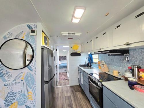 Waterfront Escape - Margie 1974 Silver Streak