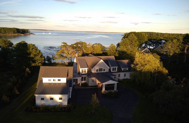 Waterfront estate near Portland with pool, dock and sweeping views of Casco Bay.