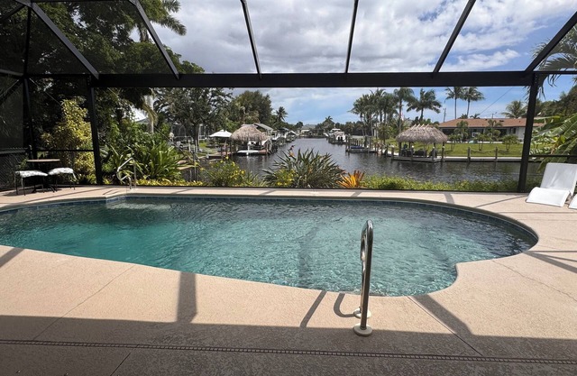 Waterfront, gulf access, heated pool, dock. Near caloosahatchee river!