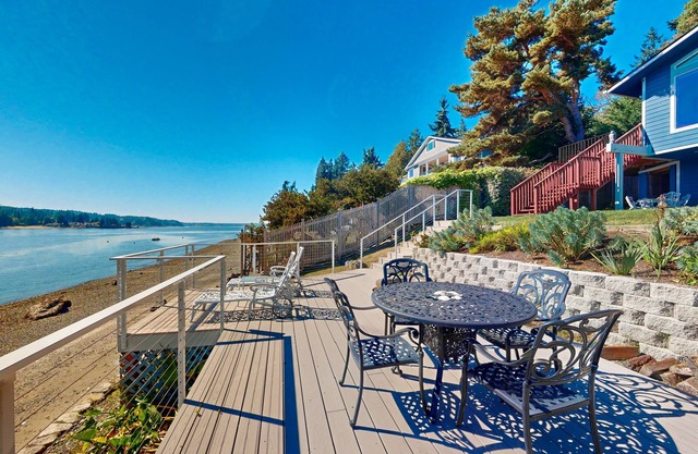 Waterfront home with private beach, amazing views, great deck, & game room