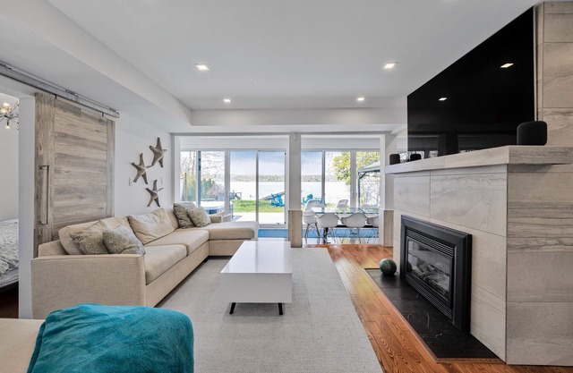Waterfront home, city/sunset views & steps to beach, Sleeps 12 + new hot tub