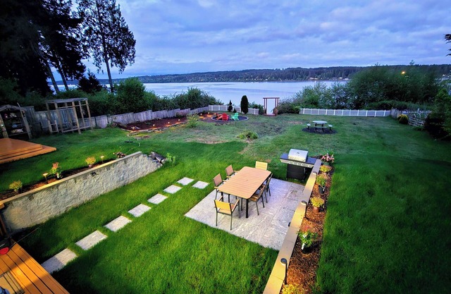 Serene Waterfront Home: Private Beach, Hot Tub & Game Room