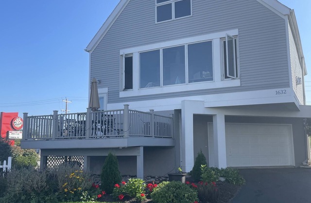 Waterfront home;heated pool & spa: private beach; walk to food, bars, live music