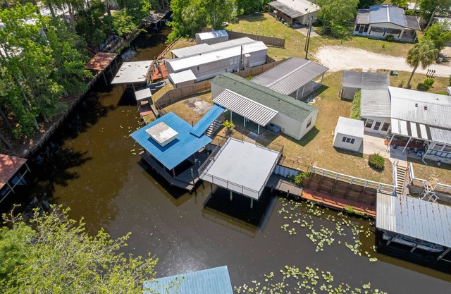 Waterfront home in Satsuma. Two bedrooms each with full bath. Gas grill.