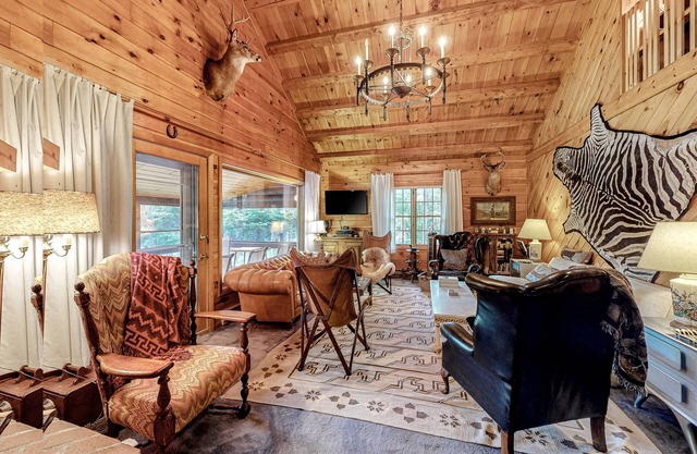 Waterfront Home on Moose River with Firepit, Porch, Pool Table, Great River View
