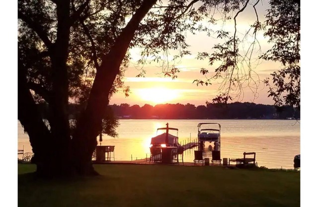 Waterfront home on Oneida Lake. Additional parking for trucks, trailers, sleds.