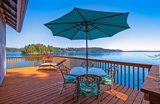 Waterfront Home w/ Wraparound Deck, Grill, Pellet Stove, & Private Beach