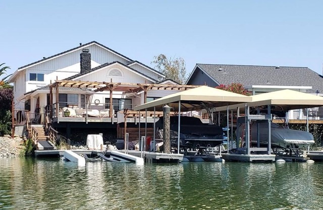 Waterfront Home with large boat dock & boat rental and other water toys