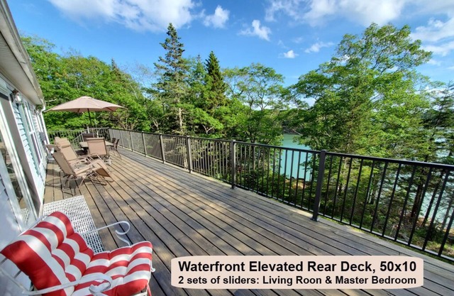 Waterfront Home with Spacious 50ft x 10ft Deck Overlooking Water
