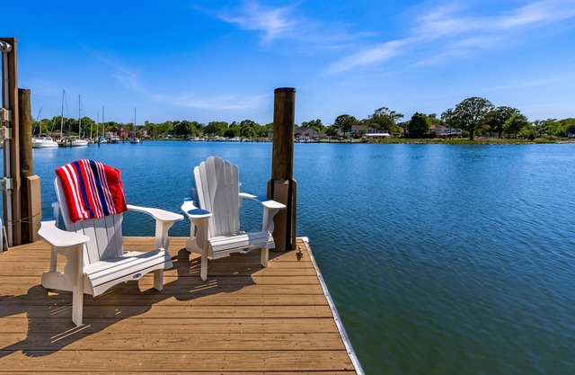 Waterfront home with spacious deck, dock, washer/dryer & central AC
