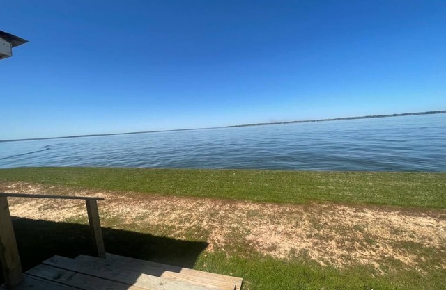 Waterfront home with AWESOME sunsets! Amazing boat/jet ski house. Fish & Swim